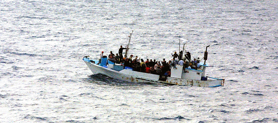 refugees on boat at sea
