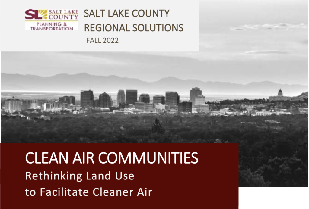A black and white photo of the Salt Lake City skyline. Distant mountains are obscured by haze. Text: Salt Lake County Regional Solutions Fall 2022. Clean Air Commuities,